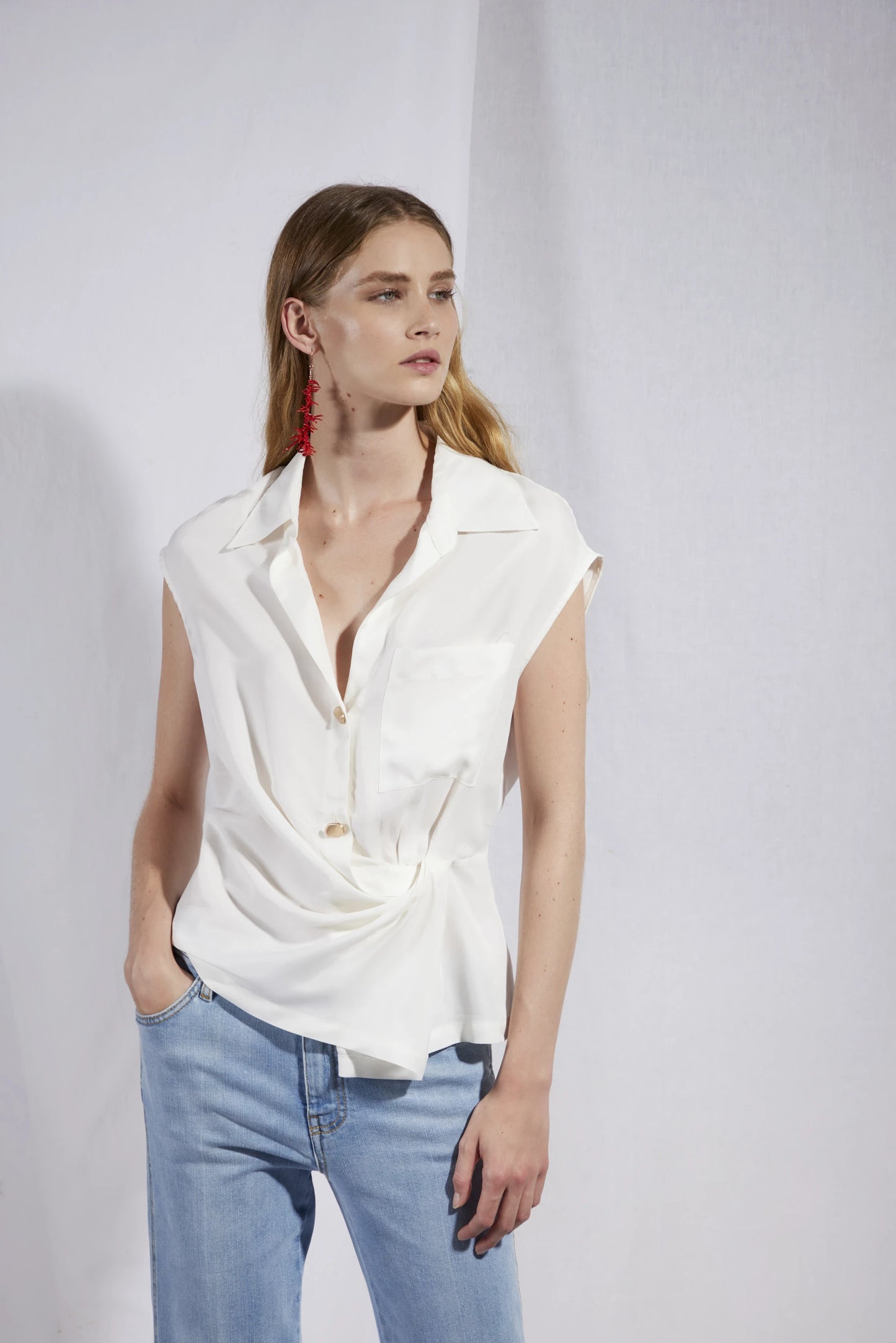 Sleeveless Blouse With Side Knot At The Waist
